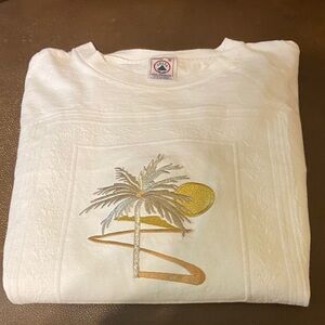 Delta White T-Shirt with Palm Tree Design